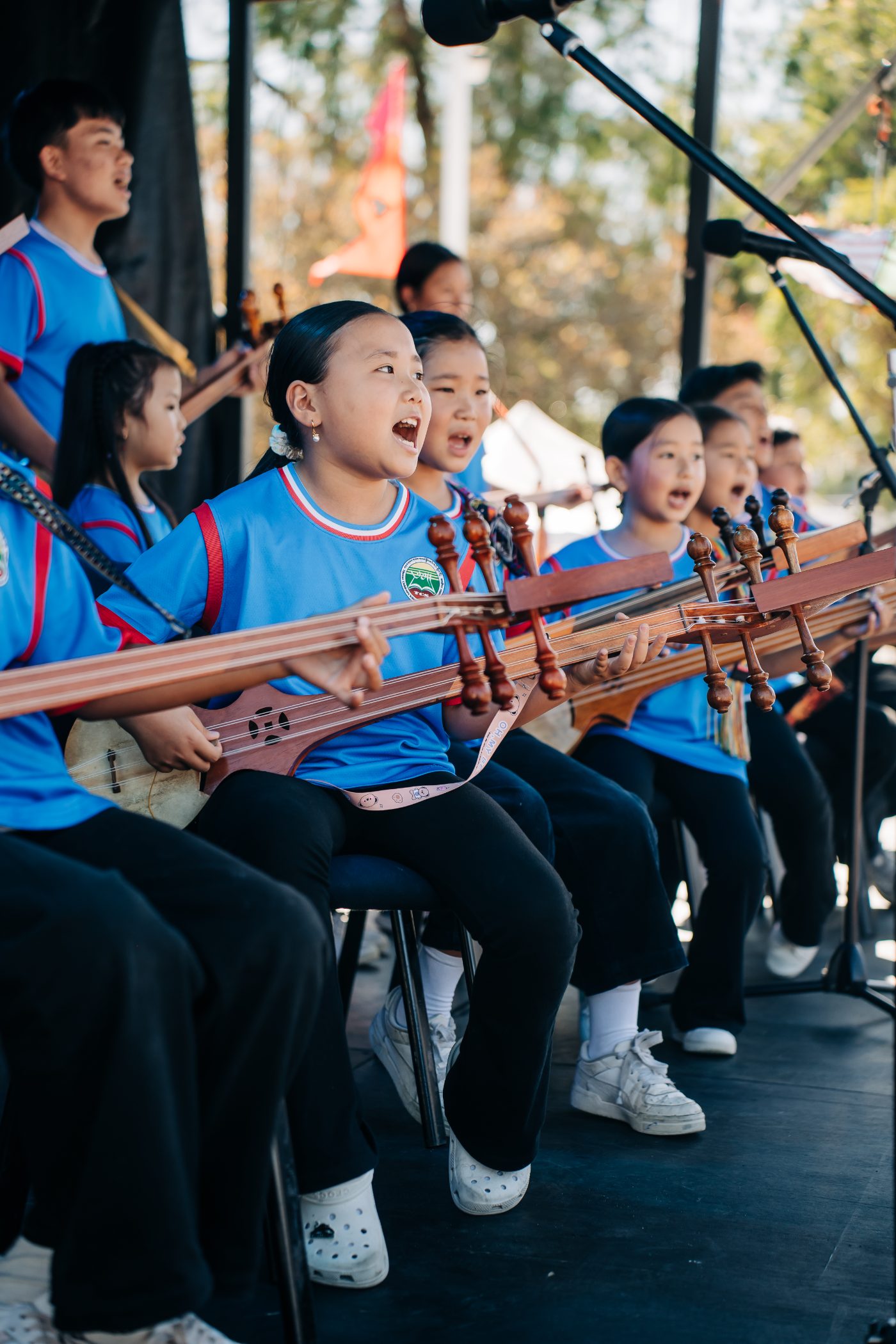 Young musicians performing on stage