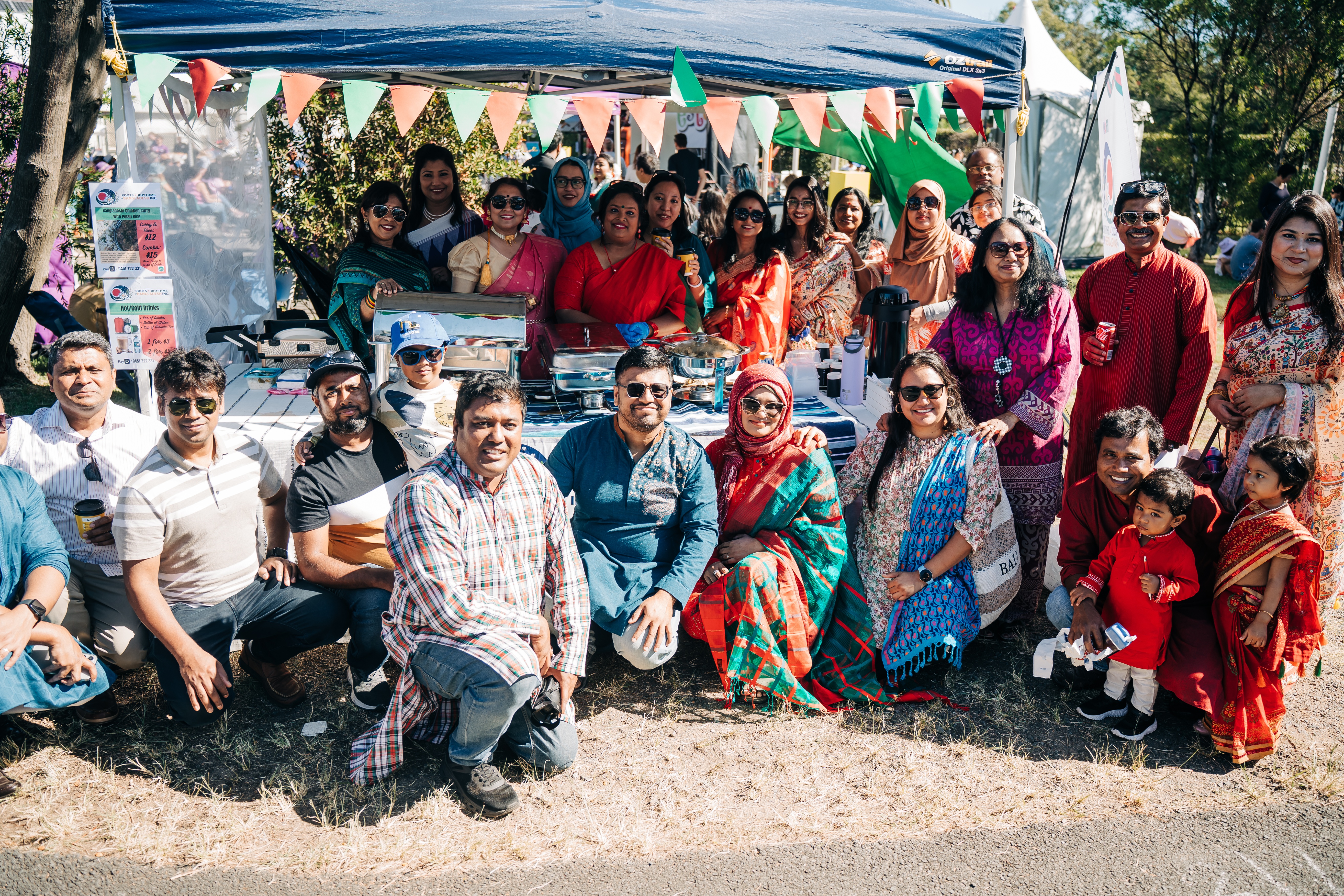 Members and community leaders celebrating at a multicultural festival