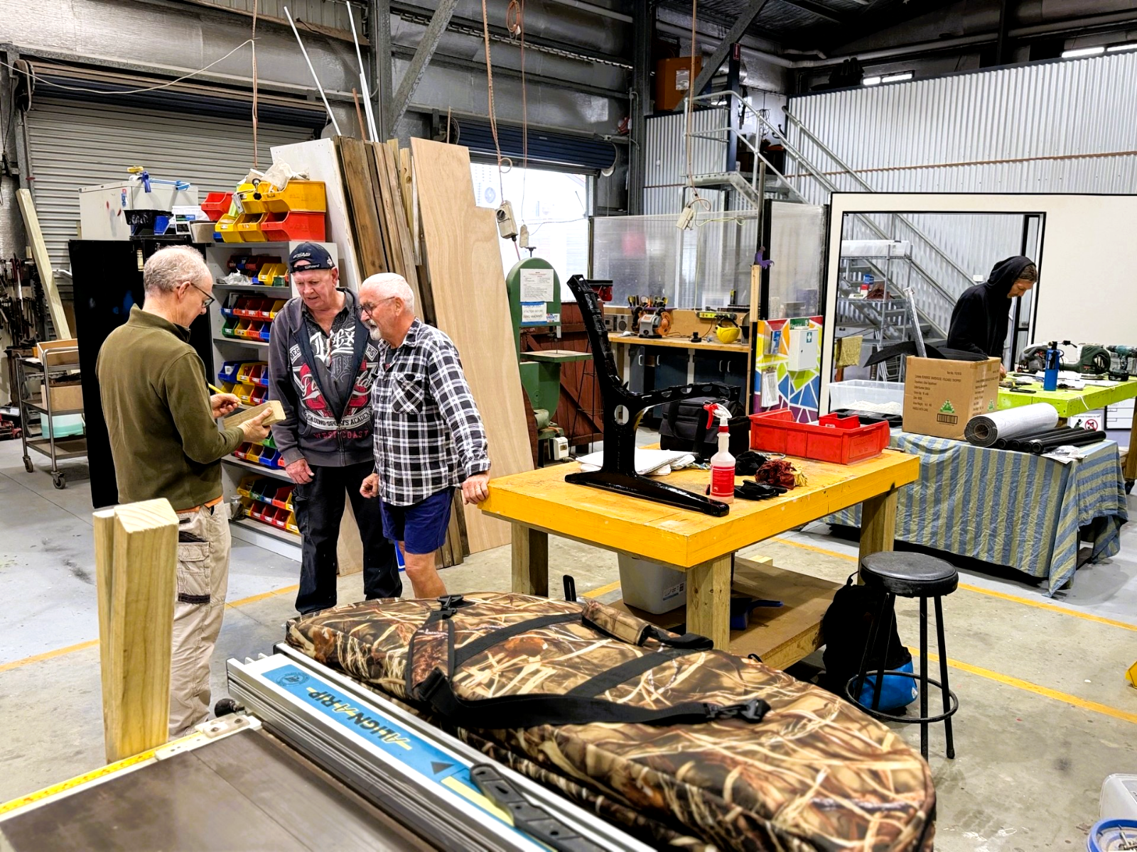 Volunteers working together in the HMC community shed